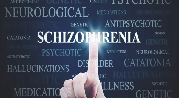Dito, la schizofrenia è ereditaria, con parole chiave come "genetico", "neurologico" e "psicotico" che circondano il termine centrale.